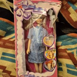 PREGNANT BARBIE/ THE BELLY OPENS & A SMALL BABY IS THERE./ NEVER USED/ BOX IS RIPPED A LITTLE BUT THE BARBIE HAS NEVER BEEN OUT  OF  BOX