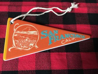 New 5 1/4 x 2 1/2” ceramic SF pennant ornament