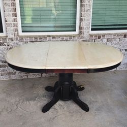 Solid Oak Table With Leaf.   Needs Refinishing