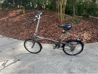 20” tires foldable bike perfect for travel or camping in GOOD condition also come with lock and keys