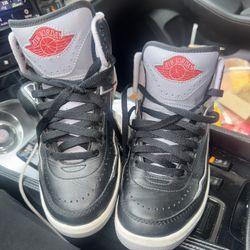 2 Pairs Jordans 1 a Size 4 And One Size 5 And Timberland Boots Size 5