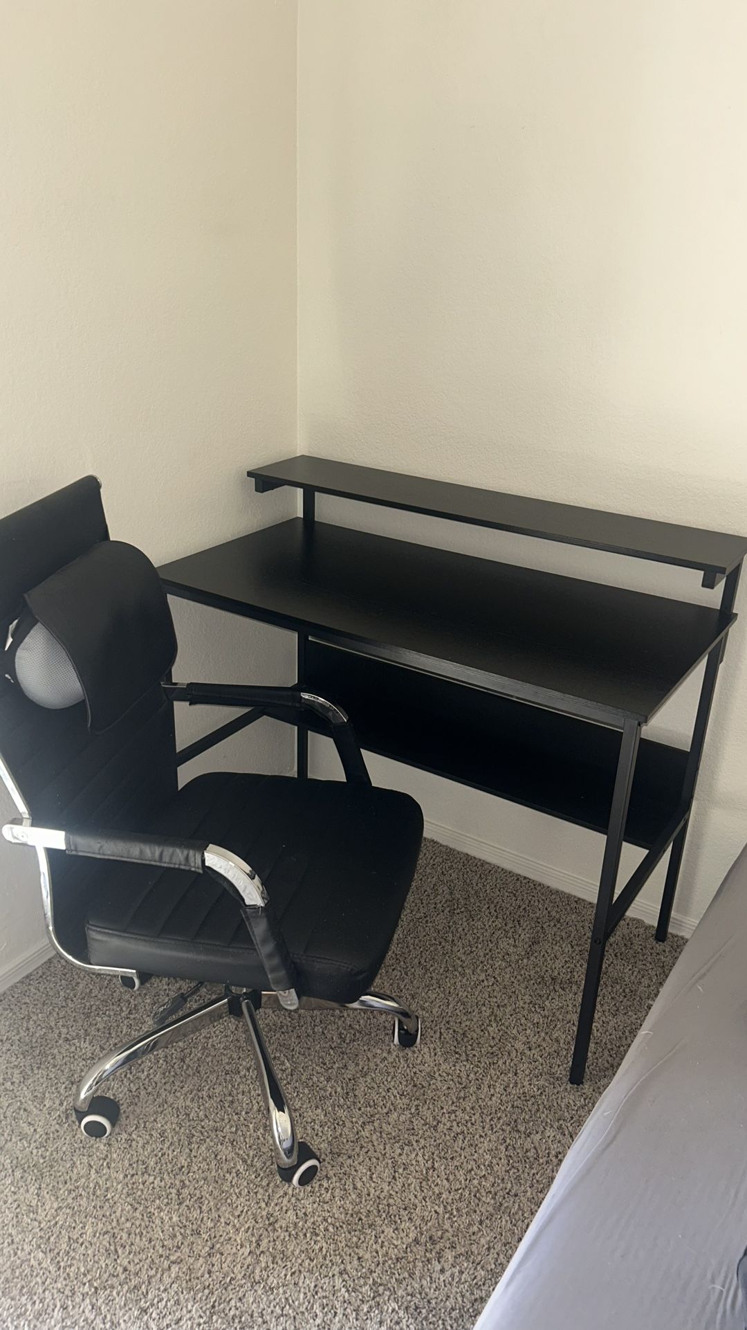 Black Desk and Ribbed Office Chair