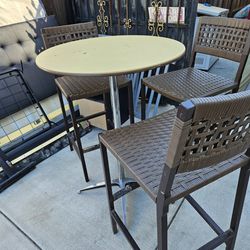 Patio Furniture Set. 3 Wicker High Chairs And A Round Table
