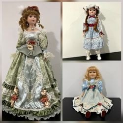 Three beautiful porcelain dolls. Victorian style and historical ornamentation, popularized between 1860 and 1900. Art and collector's pieces.