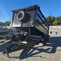 NEW DUMP TRAILERS 8X12X4 ROLLING TARP AND SPARE TIRE 2025 YEAR ELECTRIC BRAKES LIGHTS REMOTE CONTROL TITLE IN HAND READY FOR WORK🙂🙂🙂🙂🙂