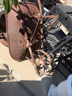 Vintage wheelbarrow for yard art