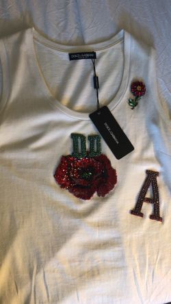 Used but you have a sticker. Dolce gabbana