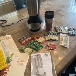 Flavia Fusion Coffee Maker with manual guides, extra coffees, teas, espresso, syrups, sprinkles and licensed travel thermos. Nothing wrong with unit, 