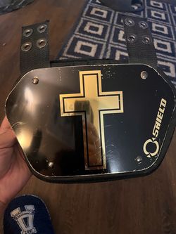 Golden cross backplate for football