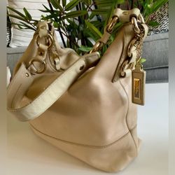 Vintage Cole Haan hobo shoulder bag in clay/beige soft leather is in nice vintage preowned condition with signs of use, nothing major, interior is ver