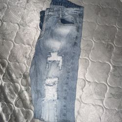 Ripped Slant Pocket Jeans Light Wash / 33