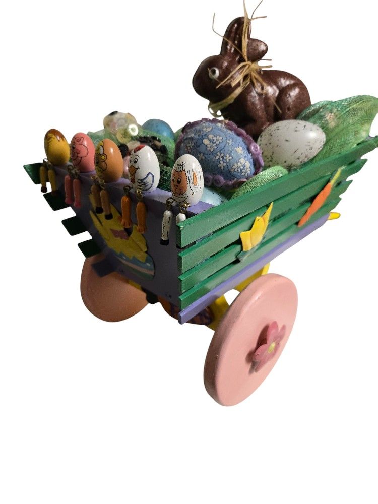 wooden hand painted decorated Easter wagon with bunny and decoated eggs