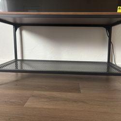 brown wood and black metal tv stand with shelf 