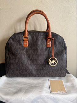 Michael Kors original ( not from outlet) medium bag. 14.5” w x 9 “ h x 7.5” d approximately