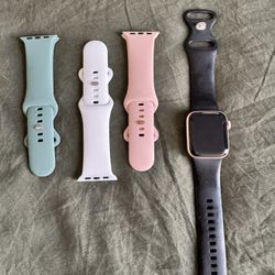 Series 4 rose gold Apple Watch with bands 