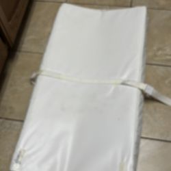 A bed to change a baby’s diaper