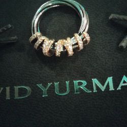 DAVID YURMAN HELENA TWISTED STERLING SILVER WITH 18 KARAT GOLD WRAP RING SET WITH VVs2 DIAMONDS  7.7 WITH ORIGINAL BAG AND BOX LIKE NEW  !!!!
