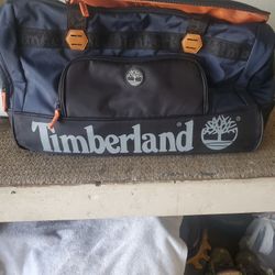 New Nice Men's Timberland Navy Blue And Black Duffle Travel Bag Value $140 Selling For Only $60