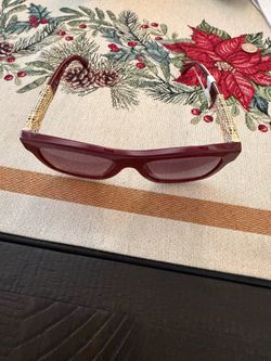 Chanel red sunglasses with tags