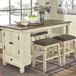 Stuman Medium Brown Drop Leaf Dining Room Set

