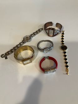 Six assorted costume jewelry watches,