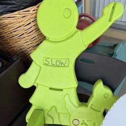 Children crossing plastic street sign