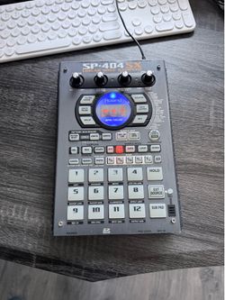 Roland SP 404 SX