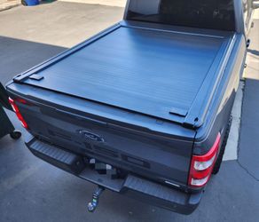 SyneticUSA Aluminum MR Manual Retractable Tonneau Cover With T-slotted Rails for 2004-2026 F150 6.5 Ft. Long bed