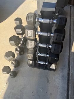 Very nice dumbbells 5-25lbs with weight rack. $300