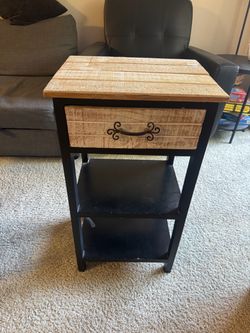 Black and wooden nightstand