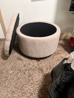 Cream brown circular sit on couch