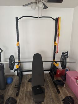 Squat Rack And Olympic Bar Bell