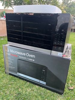 Like new open box 2.0 cu ft microwave oven 1200 watts