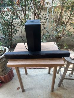 Insignia soundbar and bass speaker$35