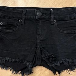 American Eagle Outfitters Super Stretch Super Low Shortie Size 0. Black W/Fringe