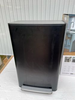 Somewhat used Kohler 47L Step Trash Can, with a few minor scratches and dents on a right side.