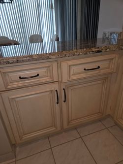 Cabinetry and granite countertops & appliance