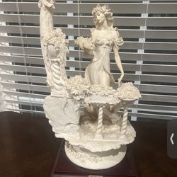G. Armani Statues