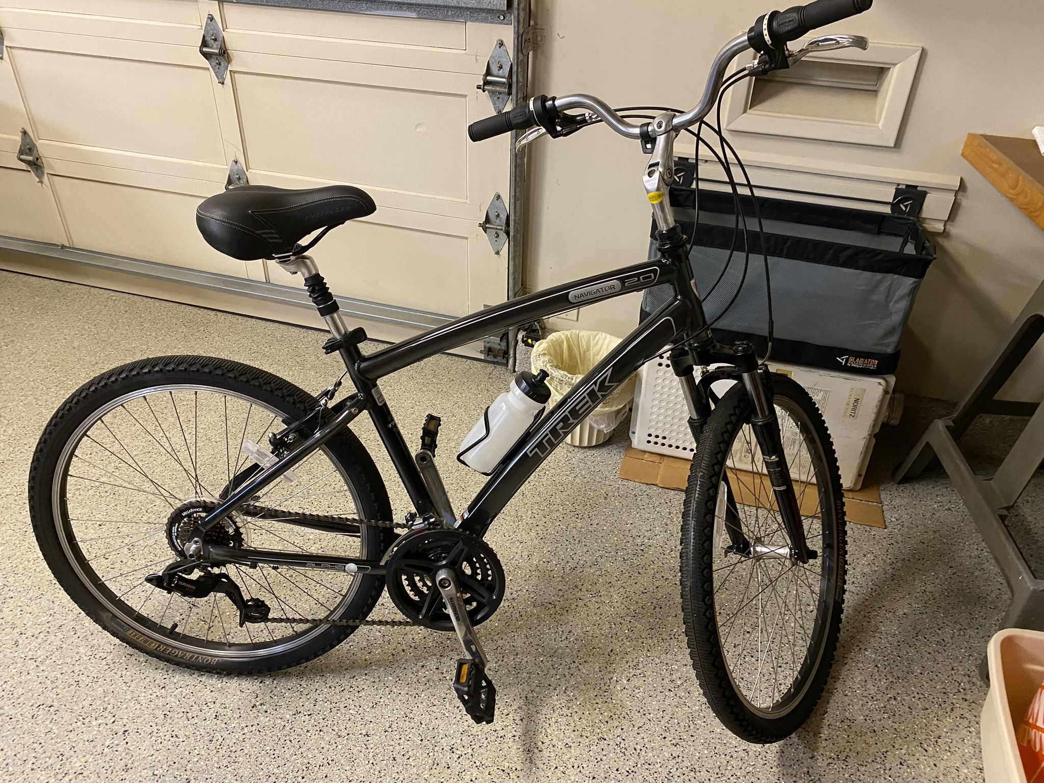 Men s Trek Navigator 2.0 18 Bike With Helmet And Hanging Bike