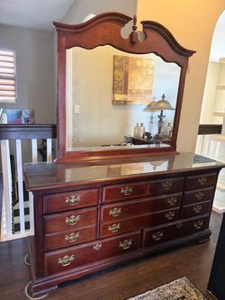 Wooden dresser with mirror