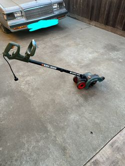 Green And Black Grass Cutter