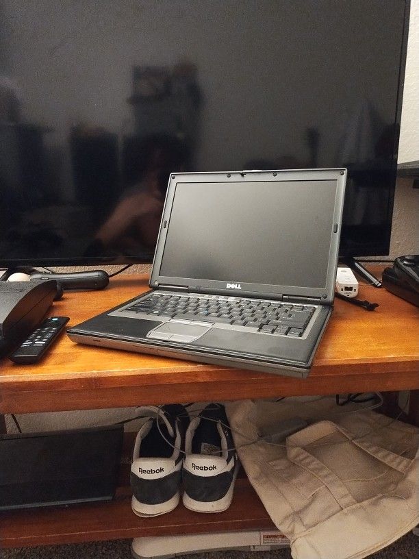DELL Latitude D630C - Comes With Charger, Disc Images, And Port Thing