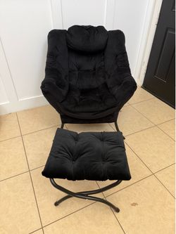 Chair and ottoman new condition