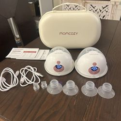 Slightly used excellent condition Mom cozy M5 wearable breast pumps