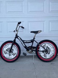 Heavy Duty Mountain Bicycle 20" Tires Brand: Dragon in good condition. Everything works well Strong tires It is better for between 6 years old and 19