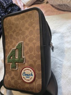 Coach 1941 Signature Canvas Sling Bag