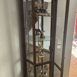 Corner Lighted Glass Curio Cabinet with Doors, Shelves, and Mirrored Back