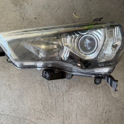 2 Stock OEM 5th Gen Toyota 4 Runner headlight Housing 