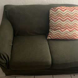 Orange Couch Green Cover 