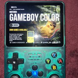 Portable Game Emulator System. Has 15,000 Games Preloaded. 